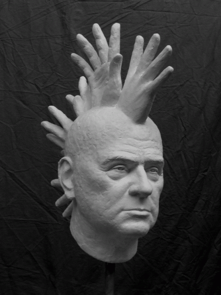 Manly head with cockscomb-shaped hands, plaster, h 60 x 20 x 40, 2011